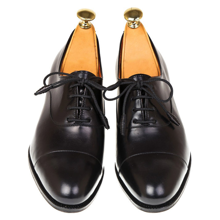 Taylor Black Derby Heels